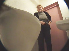 Mature and young babes taking turns to pee in spycammed john