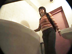 Three girls watering the spy cam planted in univercity loo