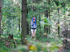 Young cutie empties her bladder in the forest