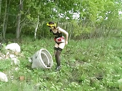 Fresh dark-haired chick pees without sitting down