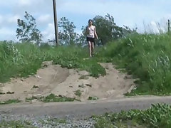 Gingerhead girl empties her bladder on a country road