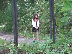Naughty college girl empties her bladder in park