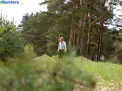 Shameless young tart caught peeing on forest path